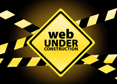 image of under construction road signs